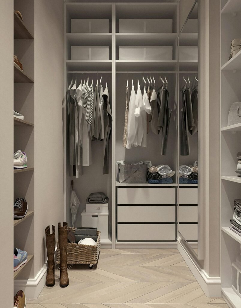 pexels-photo-3315286-3315286 Stylish walk-in closet with neutral tones and contemporary design elements.